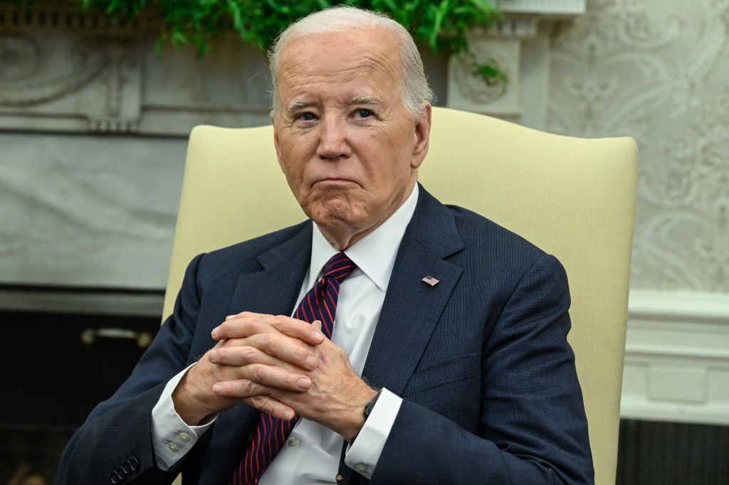 US President Joe Biden listens during a meeting with the Prime Minister of Iraq Mohammed Shia al-Sudani in the Oval Office of the White House in Washington, DC on April 15, 2024.