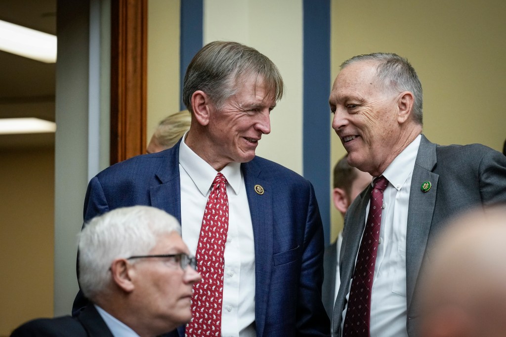 Rep. Paul Gosar (R-AZ) speaks with Rep. Andy Biggs (R-AZ) during a House Oversight Committee hearing titled "The Basis for an Impeachment Inquiry of President Joseph R. Biden, Jr." on Capitol Hill September 28, 2023 in Washington, DC.