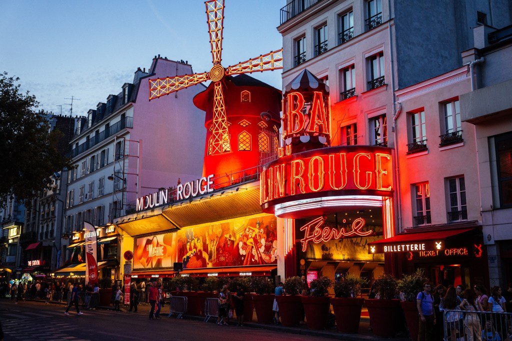 The Moulin Rouge with its windmill sails still intact is pictured on Oct. 11, 2023 in Paris. 
