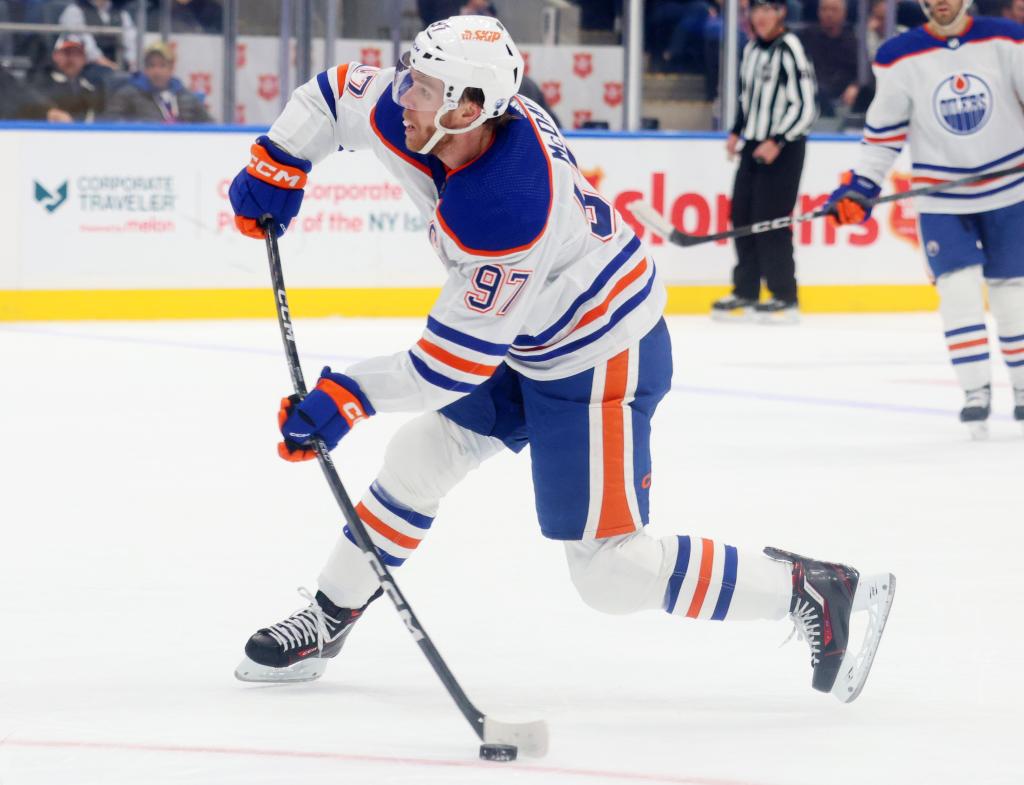 Connor McDavid (97) of the Edmonton Oilers takes a shot during the second period when the New York Islanders played the Edmonton Oilers 