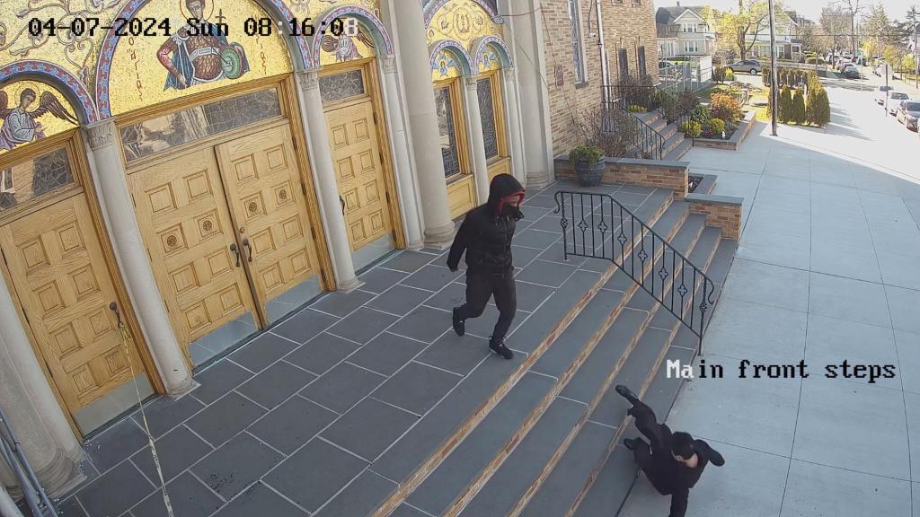 the victim falling to the bottom of the steps as her attacker looms at the top of the steps