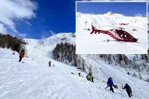 In this handout photo provided by Kantonspolizei Wallis via Keystone, Rescuers work on a site of an avalanche fell on the Riffelberg, Switzerland, Tuesday, April 2, 2024