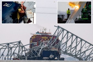 TOPSHOT - The collapsed Francis Scott Key Bridge lies on top of the container ship Dali in Baltimore, Maryland, o