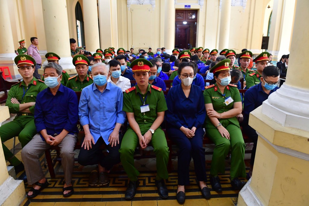 Defendants attend a trial for their involvement in the $12.5 billion fraud case on Thursday in Ho Chi Mihn City, Vietnam.