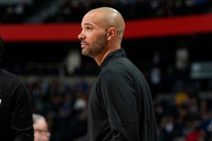 Sacramento Kings assistant coach Jordi Fernandez watching an NBA game, now hired as Brooklyn Nets' coach