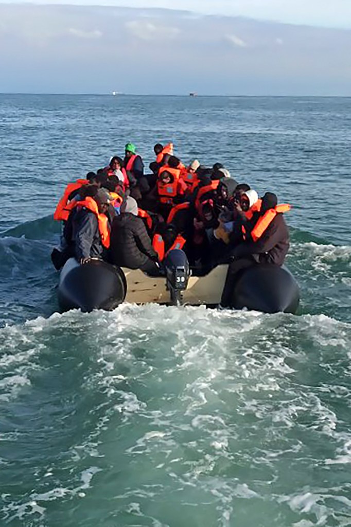 This photo provided by the Prefecture Maritime du Nord et de la Manche shows migrants continuing their journey to Britain off northern France coast, Tuesday, April 23, 2024. 