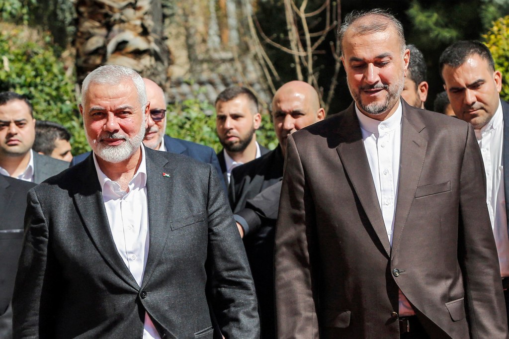 Iran's Foreign Minister Hossein Amir-Abdollahian and Hamas' political bureau chief Ismail Haniyeh at the foreign ministry headquarters in Tehran, Iran in March.