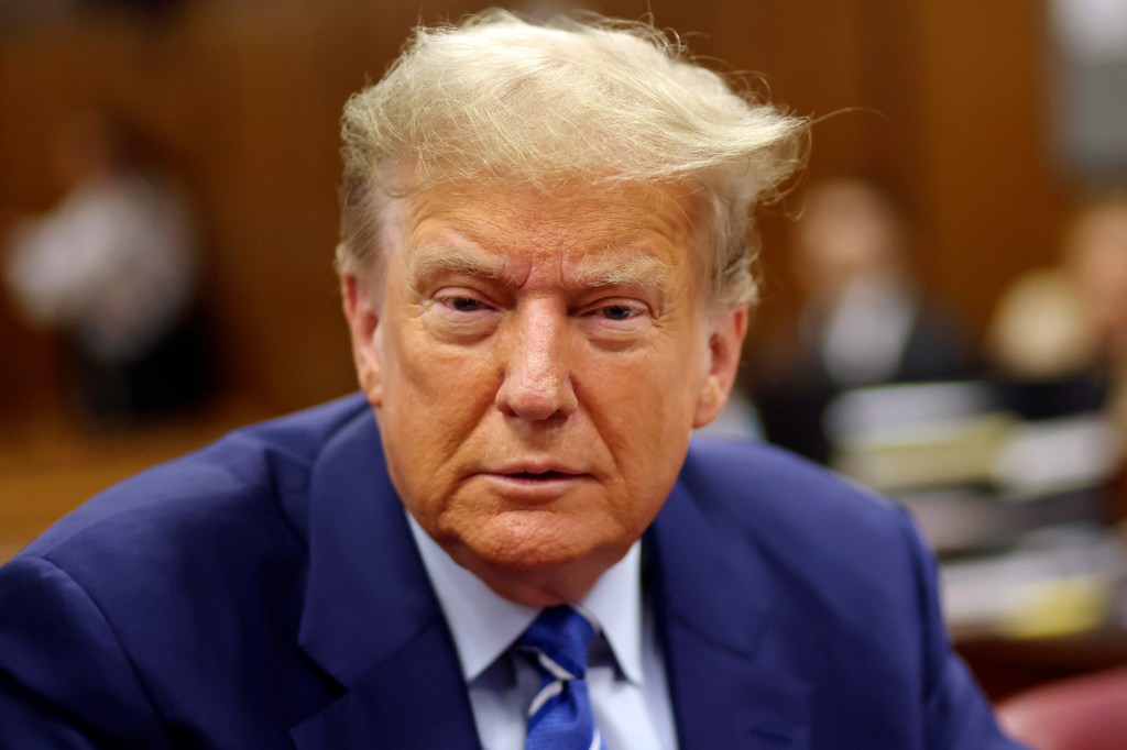 Donald Trump awaits the start of proceedings on the second day of jury selection at Manhattan criminal court, Tuesday, April 16, 2024, in New York.