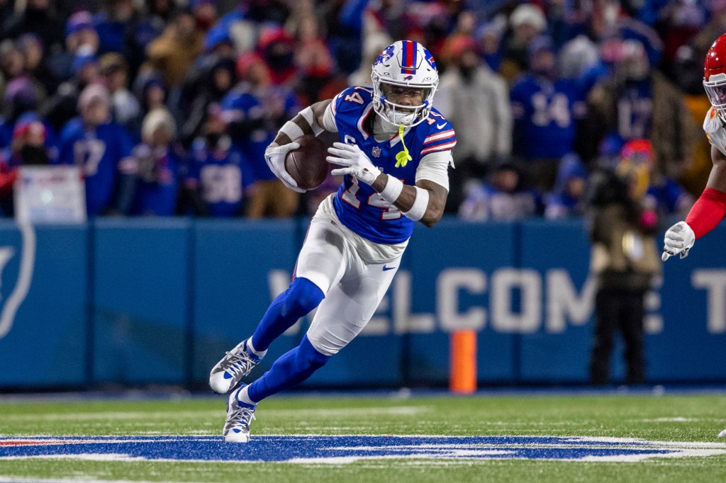 Buffalo Bills wide receiver Stefon Diggs (14) running with the football during a playoff game, before his trade to the Houston Texans