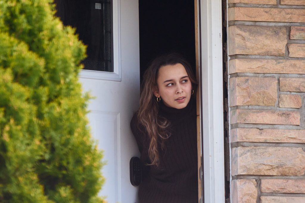 A woman spoke to a New York Post reporter after answering a knock on the door of a home at 26-07 160th St. in Queens - the same home Andaloro was arrested for trying to reclaim. 