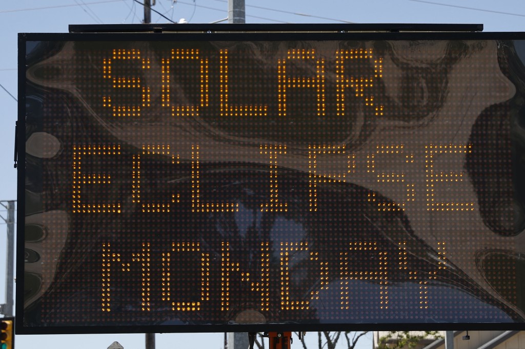 sign announcing eclipse