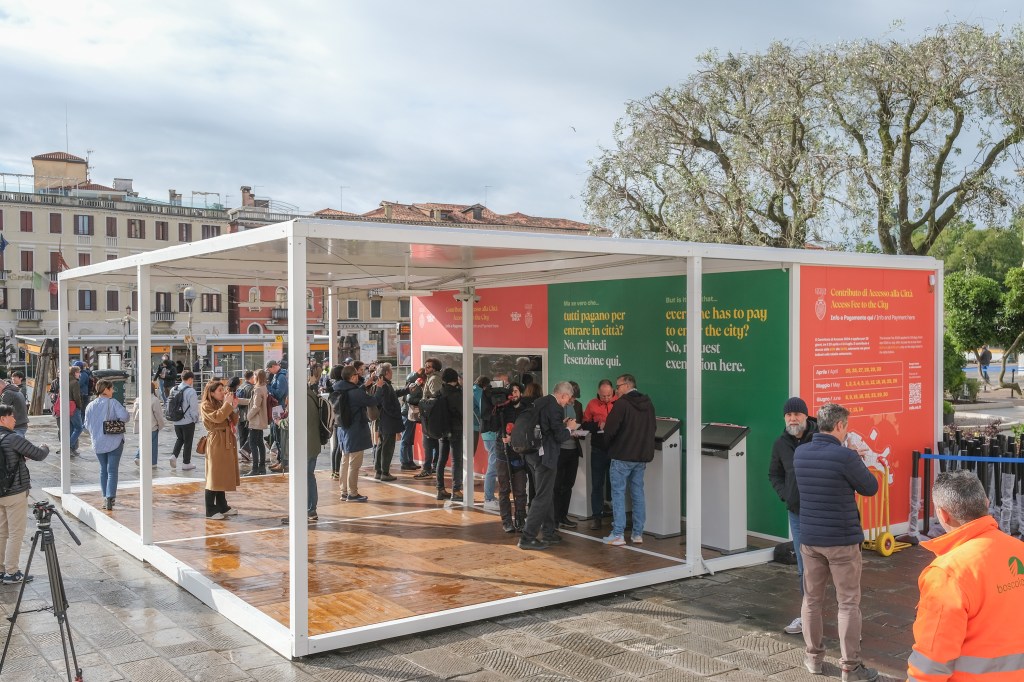 Ticket office in the forecourt of Venice, Italy railway station where visitors can pay the 5-euro entry fee launched by authorities.