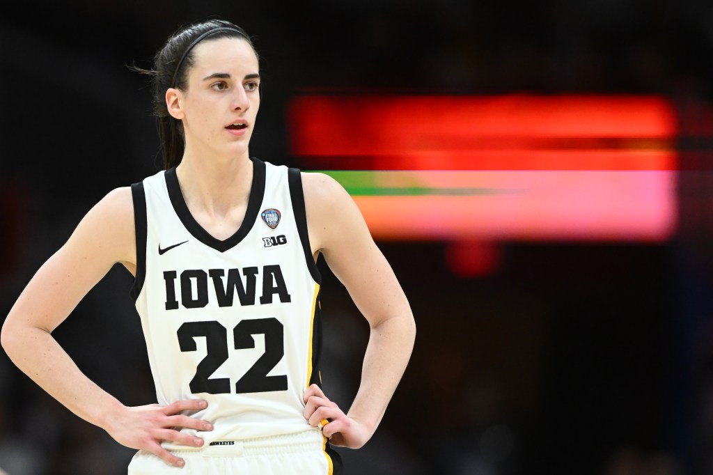 Iowa Hawkeyes guard Caitlin Clark (22) reacts against the Connecticut Huskies in the semifinals of the Final Four of the womens 2024 NCAA Tournament at Rocket Mortgage FieldHouse. 