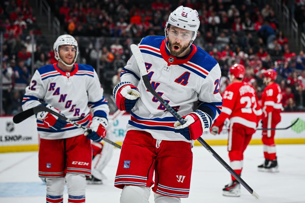 New York Rangers center Barclay Goodrow (21) celebrates his goal with center Jonny Brodzinski (22) during the first period against the Detroit Red Wings at Little Caesars Arena
