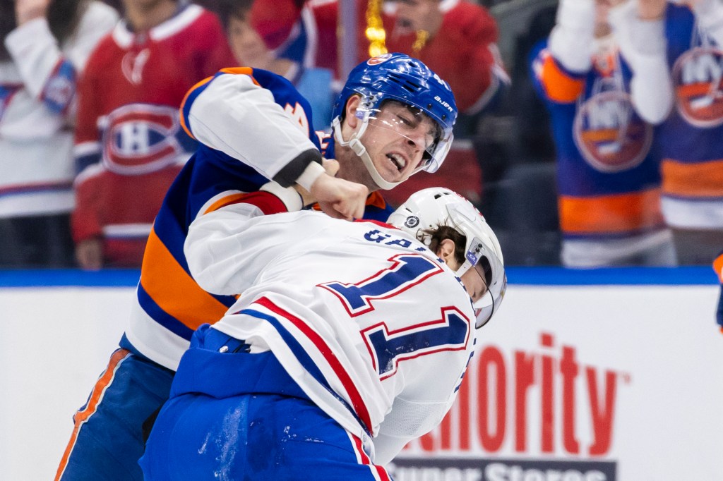New York Islanders center Jean-Gabriel Pageau (44) fights with Montreal Canadiens right wing Brendan Gallagher (11) during the second period