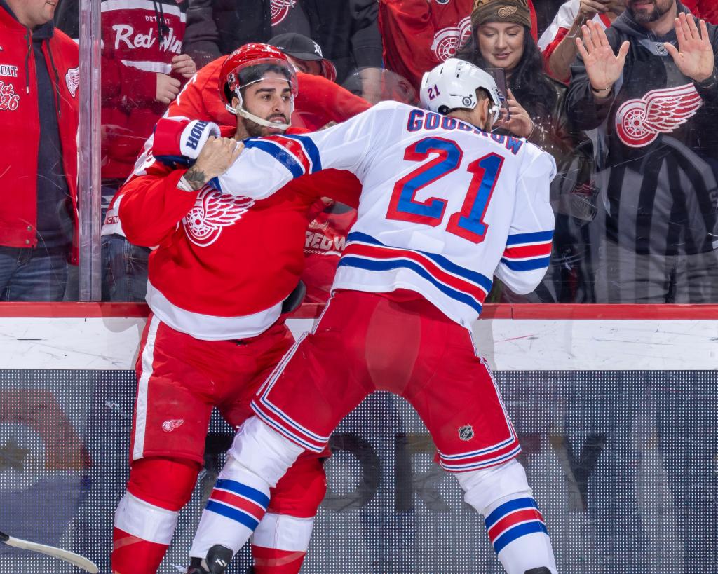 Robby Fabbri #14 of the Detroit Red Wings and Barclay Goodrow #21 of the New York Rangers get into a fight during the first period at Little Caesars Arena on April 5, 2024 in Detroit, Michigan. (