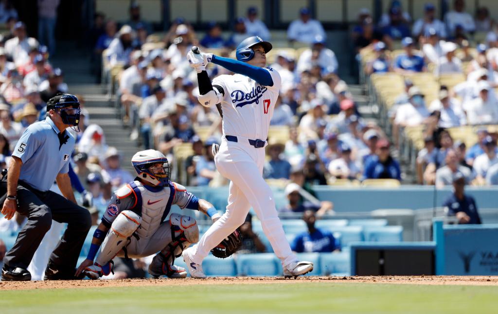 Shohei Ohtani hits a two-run homer during the Dodgers' win over the Mets on April 21, 2024.