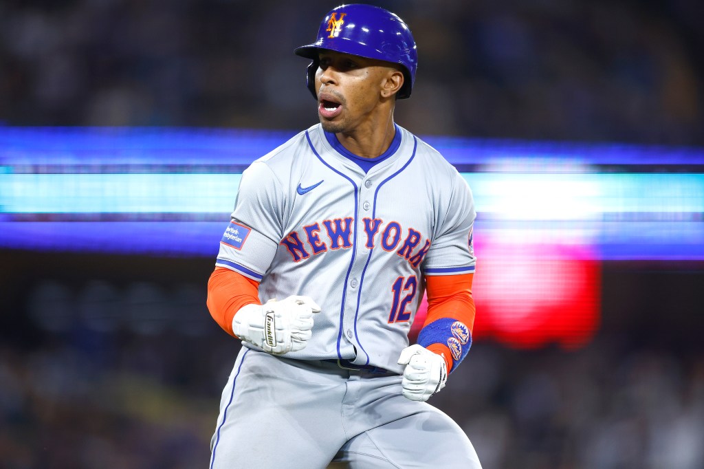 Francisco Lindor #12 of the New York Mets celebrates a two-run home run against the Los Angeles Dodgers in the seventh inning at Dodger Stadium on April 19, 2024 in Los Angeles, California. 