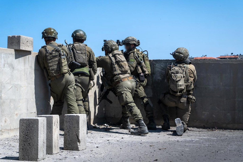 Israeli soldiers operating in the Gaza Strip amid continuing battles between Israel and the Palestinian militant group Hamas.