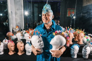 Chris Wink, one of the original founders of Blue Man Group, is "making baldness cool" with his large collection of wearable art.