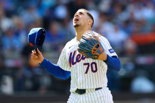 Mets starting pitcher Jose Butto reacts on his way to the dugout during the sixth inning against the Royals.