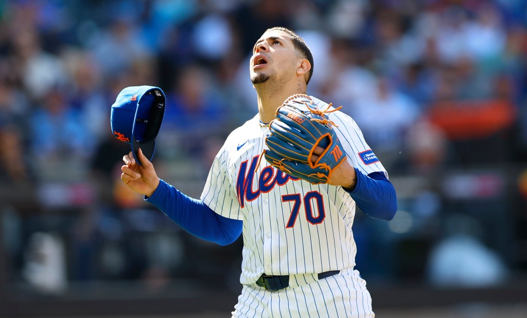 Mets starting pitcher Jose Butto reacts on his way to the dugout during the sixth inning against the Royals.