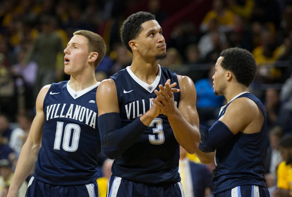 Donte DiVincenzo (l.) and Josh Hart (c.) with Jalen Brunson (r.) during a Villanova game in 2016.