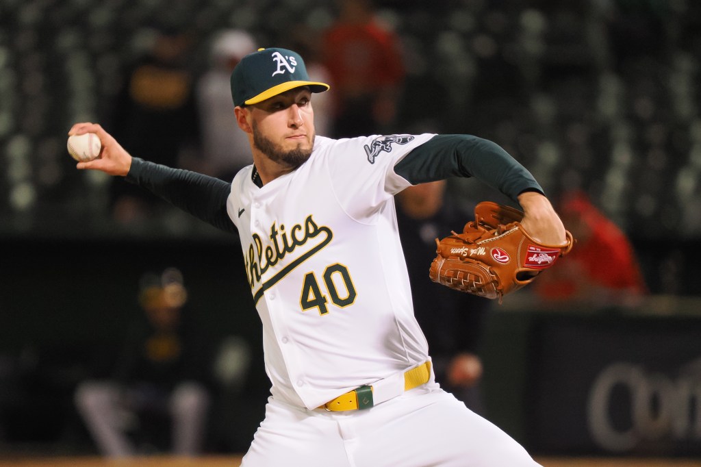 Oakland Athletics relief pitcher Mitch Spence (40) pitches the ball against the St. Louis Cardinals during the eighth inning at Oakland-Alameda County Coliseum. 