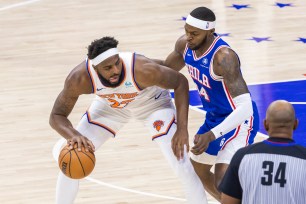 Knicks center Mitchell Robinson (23) is out for Sunday's Game 4 vs. the 76ers with an ankle injury.