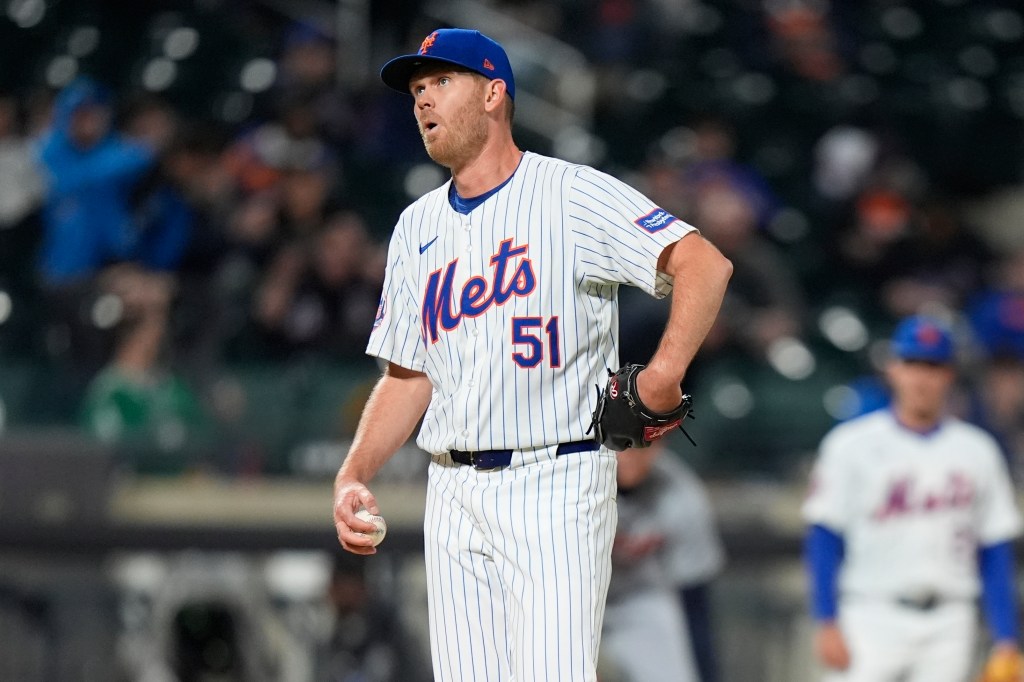 Mets relief pitcher Michael Tonkin (51) reacts after Detroit Tigers' Gio Urshela reached first base for a single