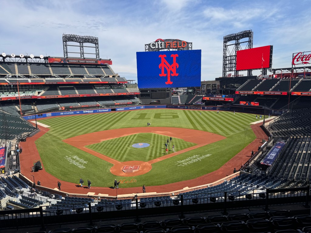 Dwight Gooden's No. 16 etched into the outfield on Sunday.