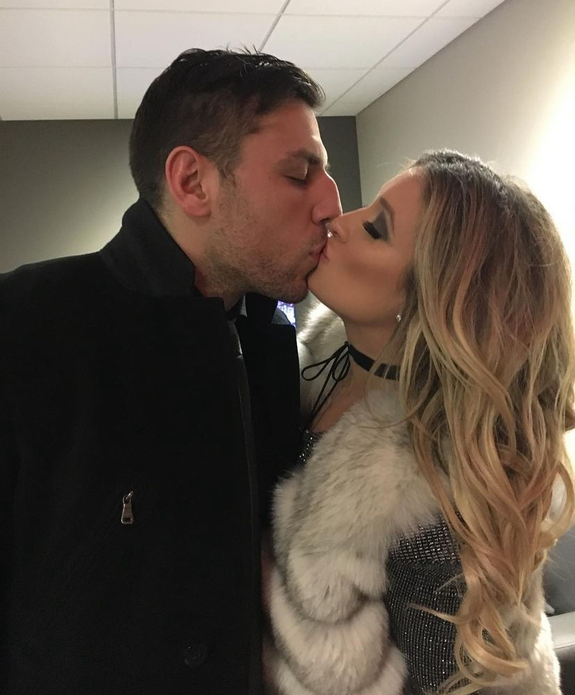 Milan and Brittany Lucic share a kiss for New Year's in 2017.