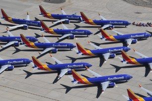 Southwest Airlines Boeing 737 MAX aircraft grounded and parked on the tarmac at the Southern California Logistics Airport in Victorville, California