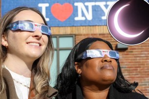 Two women wearing glasses with a moon in the background