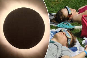 People lying on the grass with sunglasses, experiencing a total solar eclipse