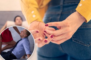 A woman putting a ring on a man's hand