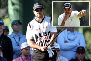 Jason Day holding a golf club