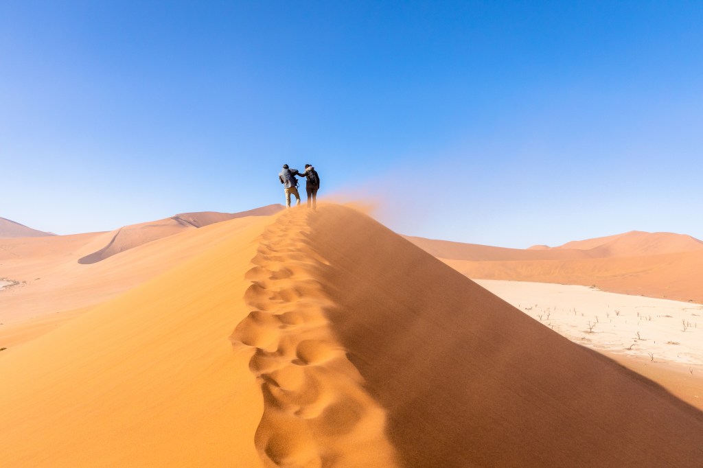 Tourists on a dune.