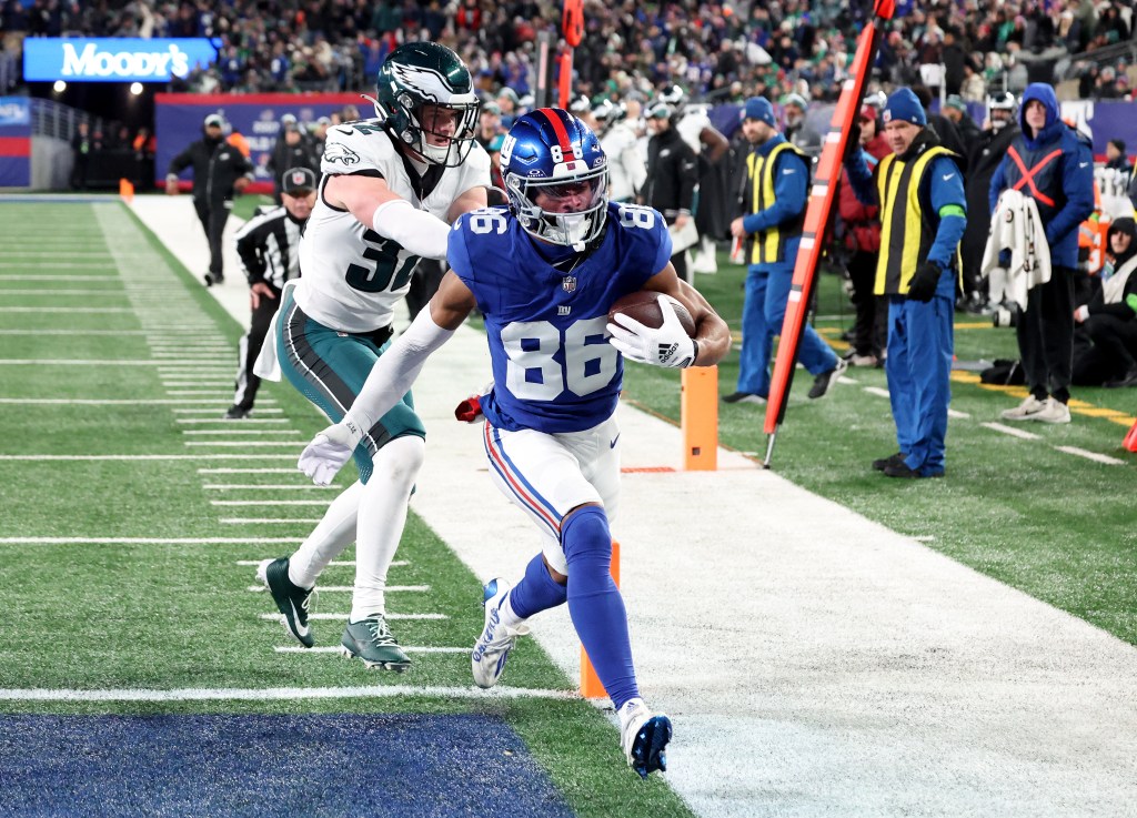 Giants wide receiver Darius Slayton (86) scores a touchdown during the first half when the New York Giants played the Philadelphia Eagles Sunday, January 7, 2024 at MetLife Stadium in East Rutherford, NJ.