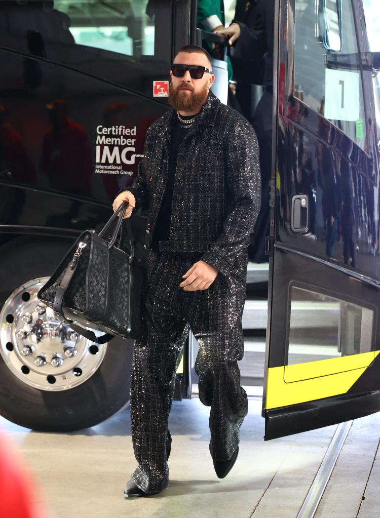 Kansas City Chiefs tight end Travis Kelce in a black suit and sunglasses arriving at Allegiant Stadium for Super Bowl LVIII