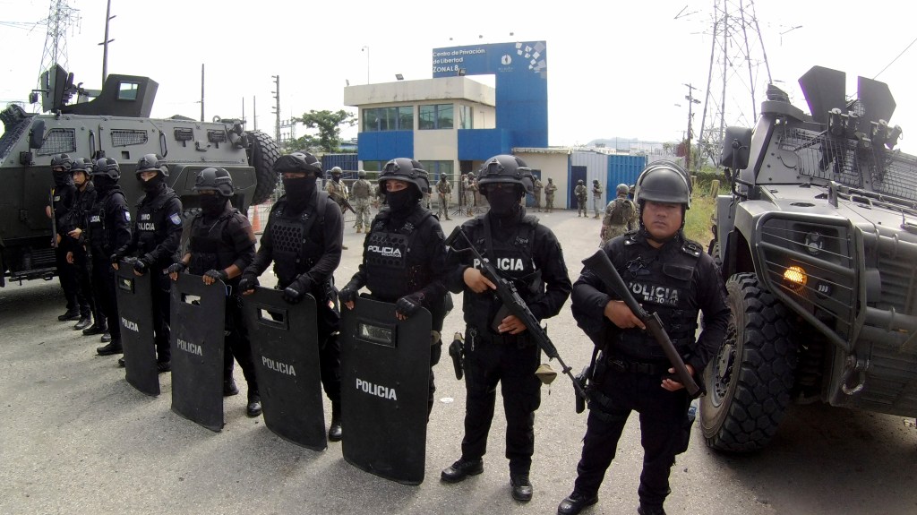 Police officers standing guard at the entrance of the penitentiary in Guayaquil, Ecuador, where former Vice President Jorge Glas is being held