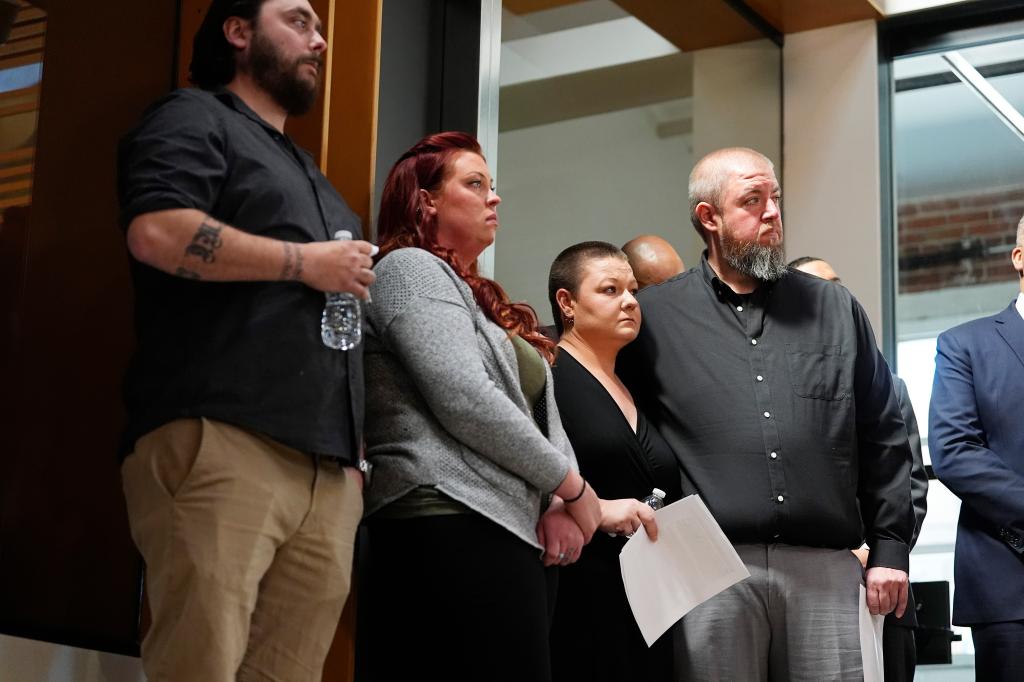 Jessica Vestal (second from the left) during a news conference to announce plans to sue the Littleton, Colo., school district for abuse suffered by their autistic children while riding the bus to class on Tuesday in Denver.