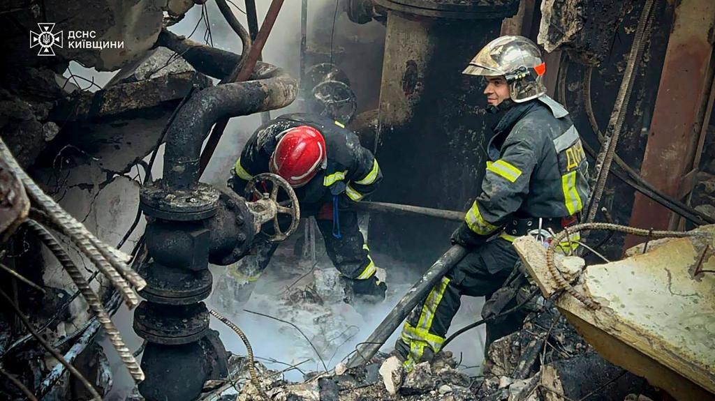 In this photo provided by the Ukrainian Emergency Service, emergency workers extinguish a fire after a Russian attack on the Trypilska thermal power plant in Ukrainka, Ukraine, on April 11, 2024. 