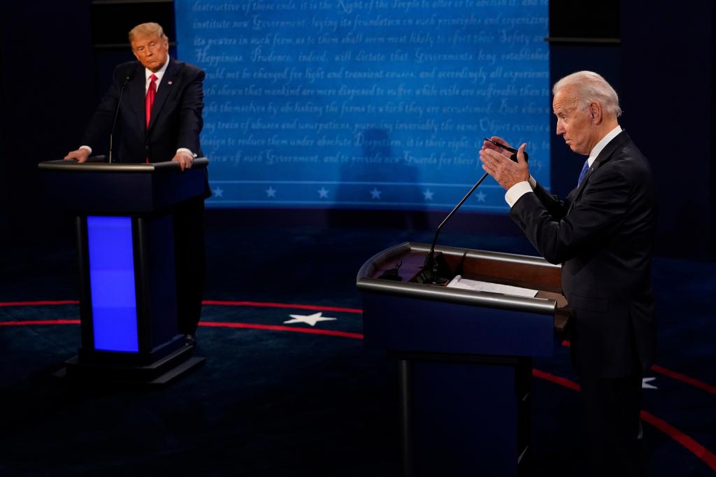 Democratic presidential candidate former Vice President Joe Biden, right, answers a question as President Donald Trump