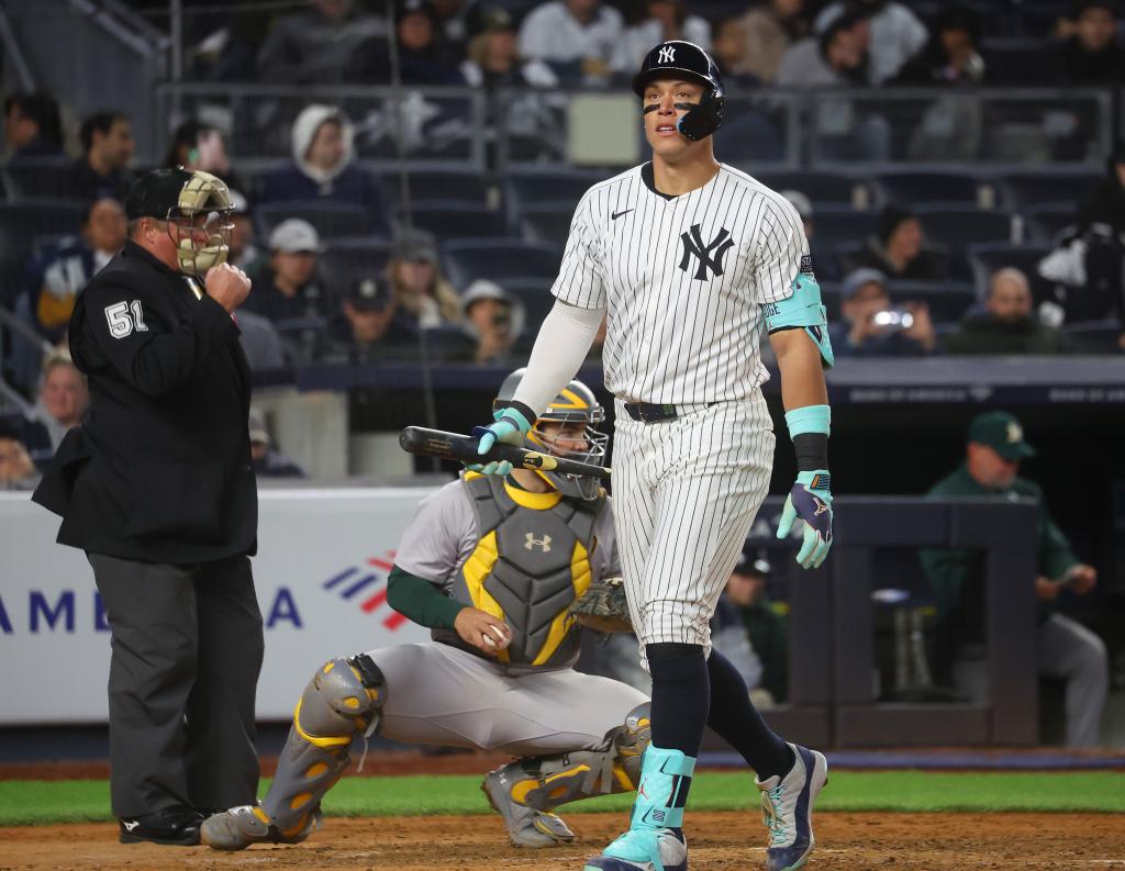 Aaron Judge walks to the dugout after striking out in the seventh inning of the Yankees' 3-1 loss to the A's.