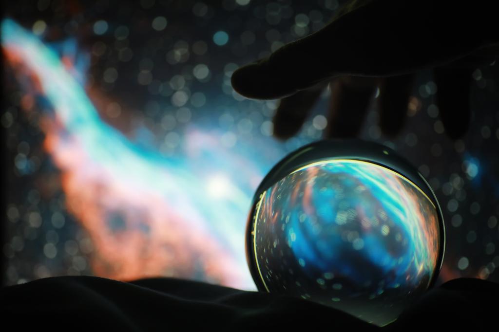 Astrological background. Crystal ball with predictions. Horoscope of the stars. Fortune telling and determination fate. Soothsayer with a crystal ball.