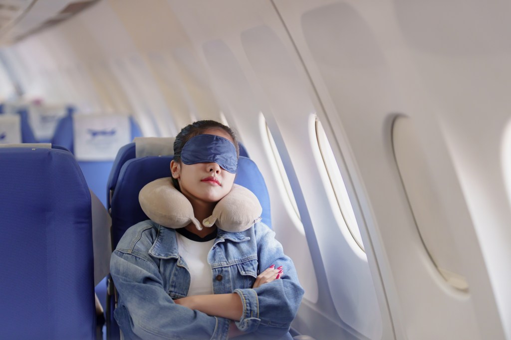 The best plane seat for sleep is the window seat, according to experts.