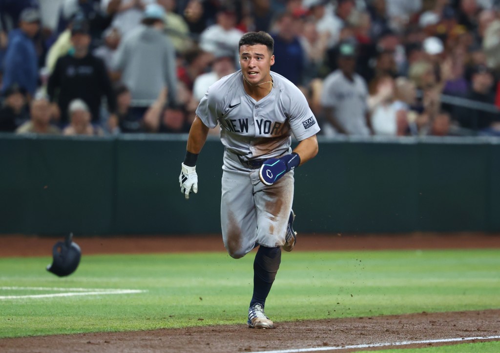 Anthony Volpe sprints home to score a run during the third inning of the Yankees' win over the Diamondbacks on Monday.