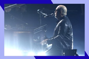 Billy Joel sings and plays piano at the Grammy Awards.
