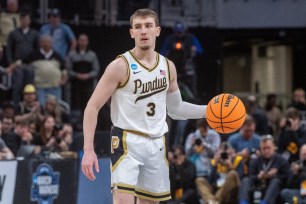 Braden Smith #3 of the Purdue Boilermakers dribbles the ball up court during the first half of a NCAA Men's Basketball Tournament - Midwest Regional game against the Tennessee Volunteers.